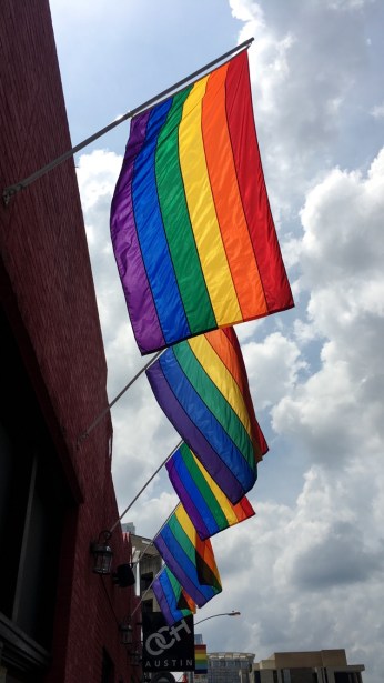 Pride flags outside Austin's gay clubs, June 6th, 2016. © J.T. Fales