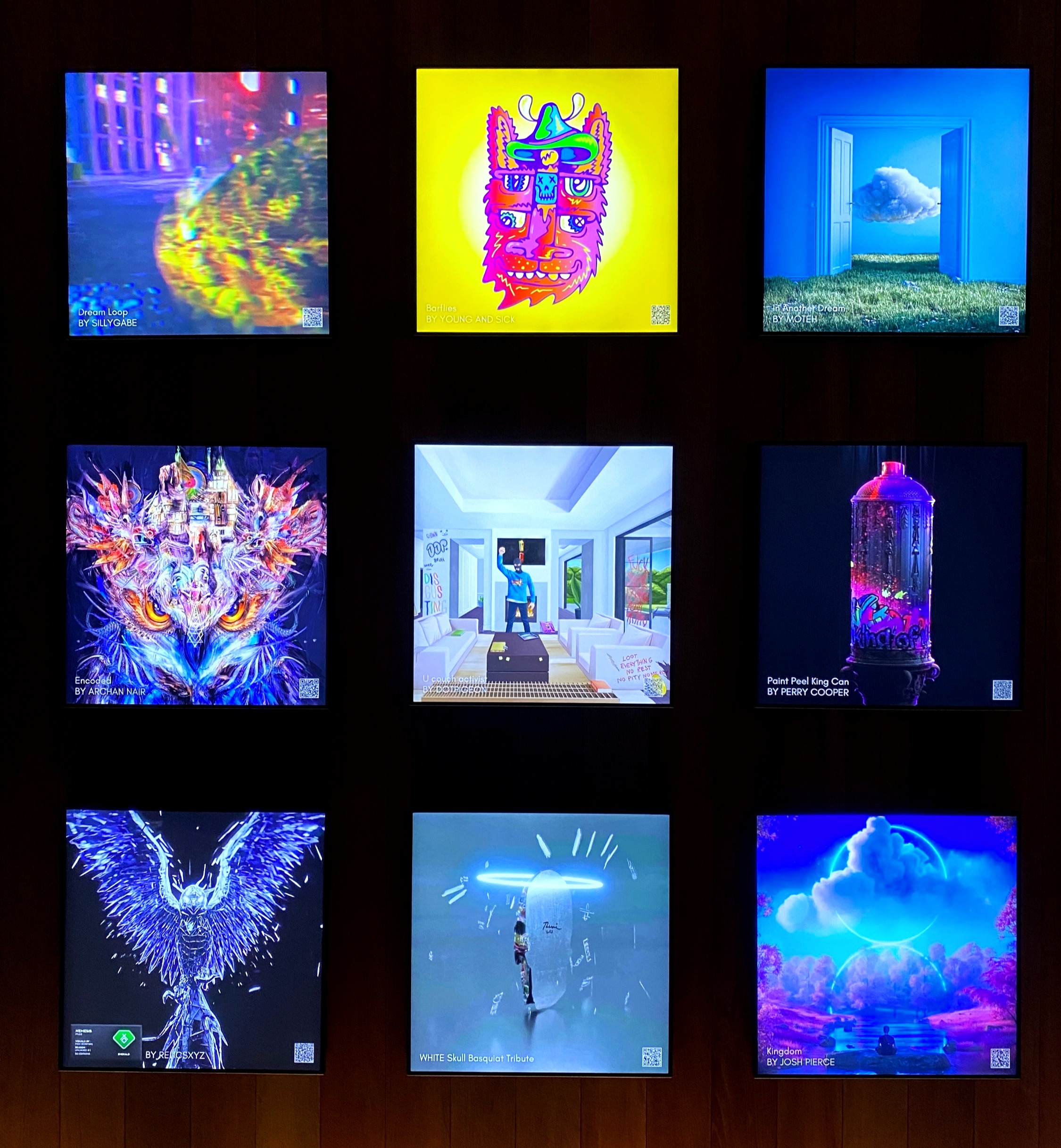 9 square display frames arranged in 3 rows of 3 showing NFT art